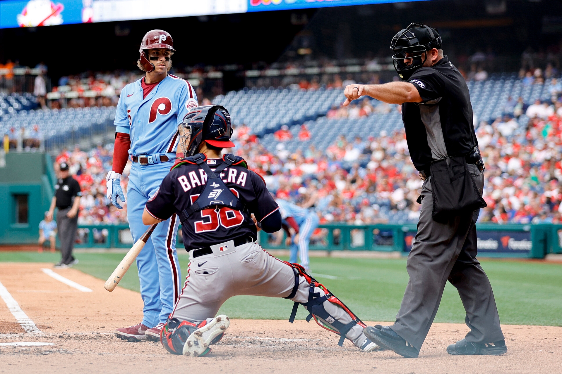 Image of MLB baseball players and an umpire