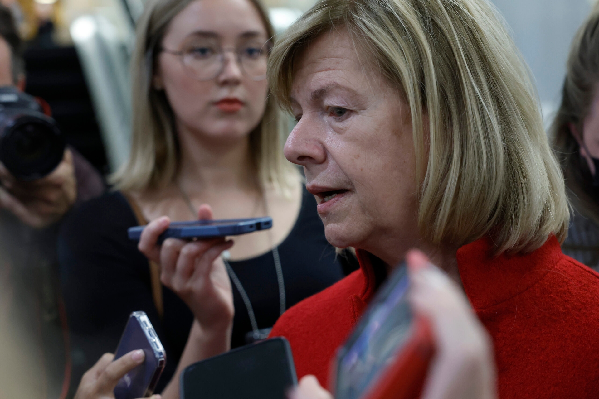 Photograph of Senator Tammy Baldwin speaking to reporters